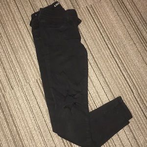 Skinny black distressed jeans